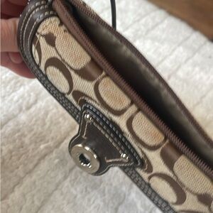 Coach Brown and Tan Signature Clutch
